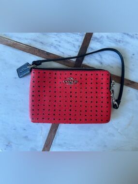 Coach Red Perforated Wristlet with Black Strap